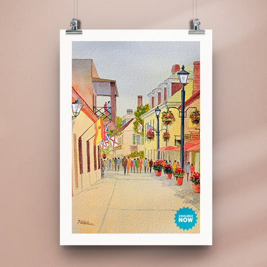 Colorful watercolor art of Aviles Street in St. Augustine, a unique gift idea for art and travel enthusiasts.